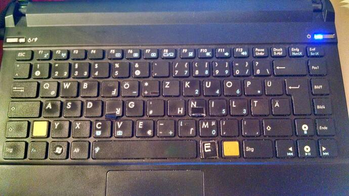 thumb-E on a laptop